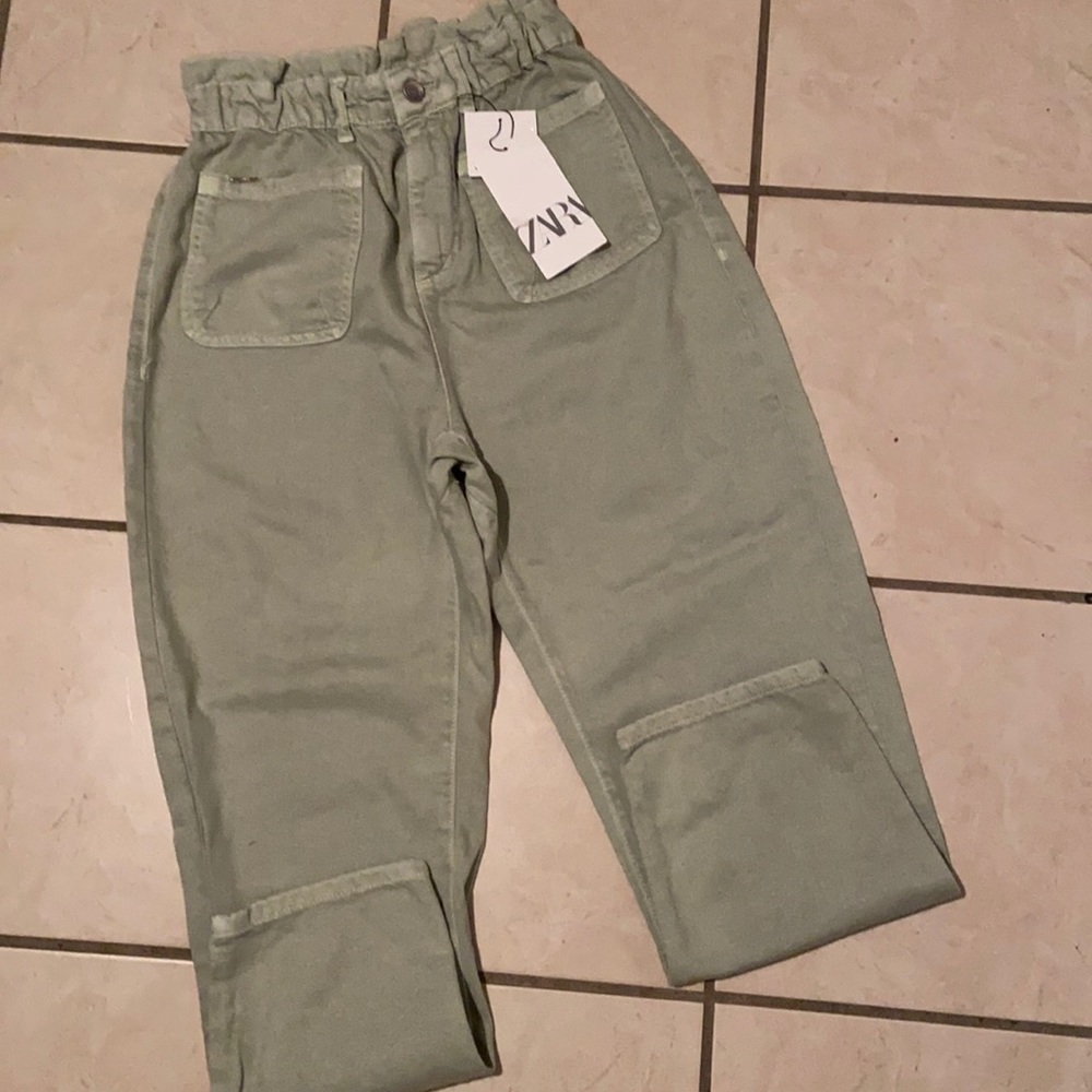 Zara size36 High waist baggy is very light green.